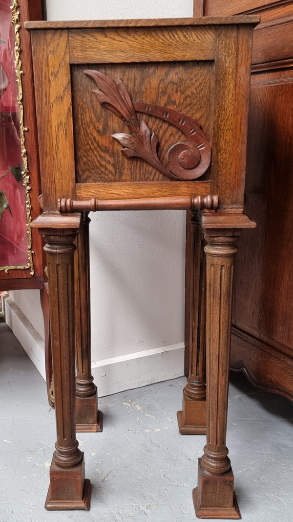 Wooden Arts and Crafts pedestal planter stand with decorative carvings. Sourced locally and is in good original condition.