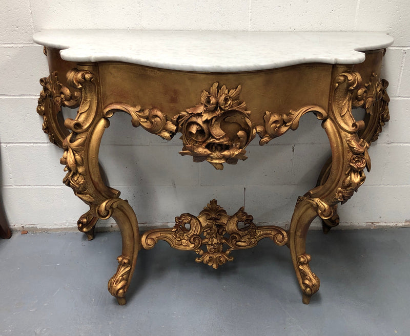 A very grand 19th century French marble top giltwood console. In very good original condition. Circa 1880.