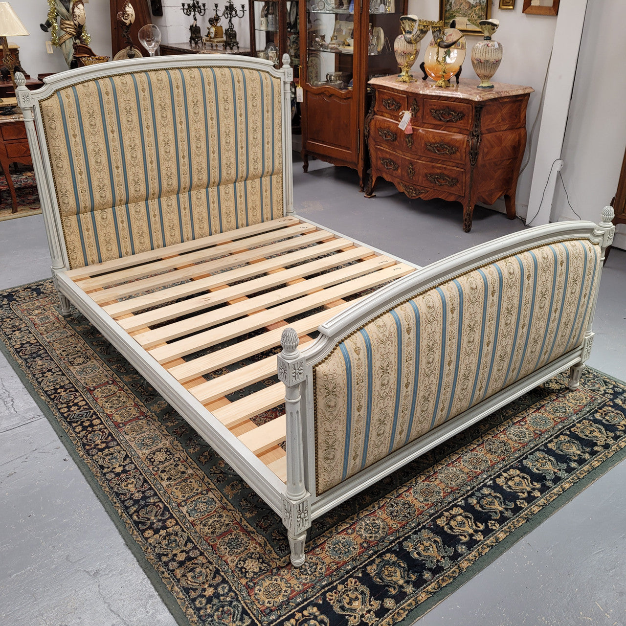 French Louis 16th style double bed and rails with original crackle paint. It also has good quality upholstery. Bed comes complete with custom made slats. Just place your mattress on top. Sourced from France and in good original detailed condition.