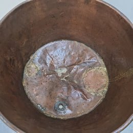 Fabulous Antique French copper pot on a solid iron stand in good original detailed condition. see photo for full description of condition.