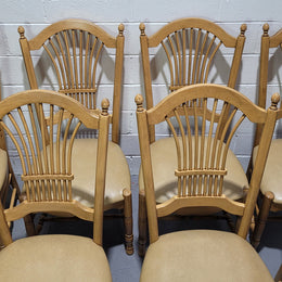 French country style set of six dining chairs and two carvers with leather seats. They are all in good original detailed condition.