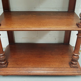 A French 19th century oak carved three tier cabinet. The cabinet/dumbwaiter has carved half border top that can be removed. Drawer for storage and in very good original condition.