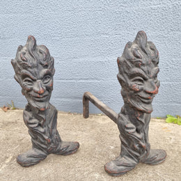 Fabulous rustic pair of French cast iron fire dogs. They are in good original condition.