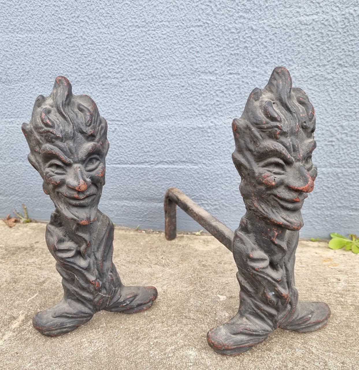 Fabulous rustic pair of French cast iron fire dogs. They are in good original condition.