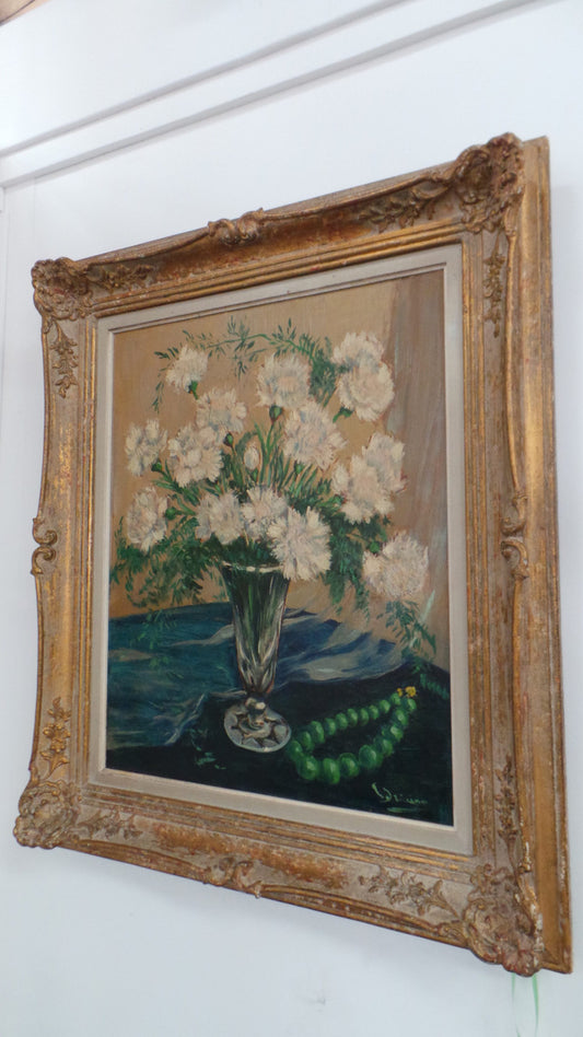 A beautiful impressionist style painting of carnation flowers oil on canvas. It is in a lovely decorative frame. It is in very good original condition.