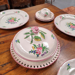 A pretty French table setting made in France called Luneville. It consists of plates, cups, saucers, tea pot, milk jug, sugar bowl, tureens and cake plates a total of 53 pieces. Please view photos as they help form part of the descriptions.