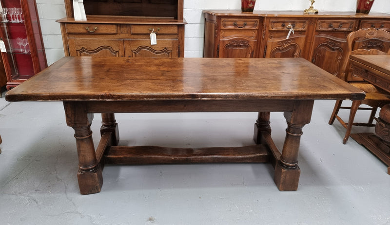 Lovely vintage French dark Oak pedestal base Farmhouse table. It can comfortable sit eight and it is in good original condition.