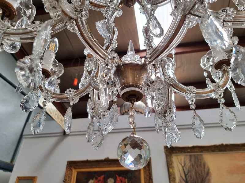 Sourced From France an attractive eight arm French crystal chandelier. It has been fully rewired to Australian standards and is in good original working condition.