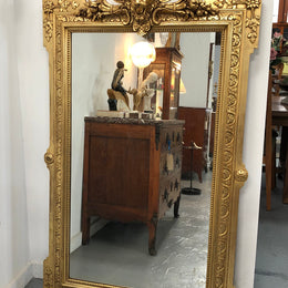 French 19th century restored gilt mirror a highly decorative French 19th Century fully restored gilt mirror. The mirror is its original mirror and contains beautiful original character. This mirror would look amazing on top of a commode or hanging by itself on the wall. In very good restored condition.
