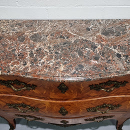 Attractive French marble top Louis XV style three drawer commode with decorative ormolu mounts. In good original detailed condition.