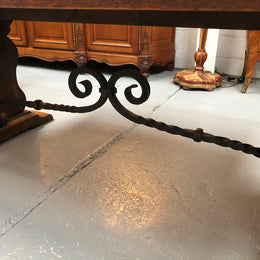 A beautiful French oak, Spanish style parquetry top extension table, with amazing carving and lovely details in very good condition.
