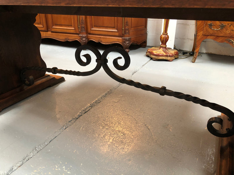 A beautiful French oak, Spanish style parquetry top extension table, with amazing carving and lovely details in very good condition.