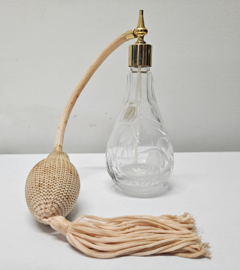 Pretty decorative Fuchsia pattern crystal perfume bottle. Produced by STUART. A bulb shape with atomiser in good working condition.