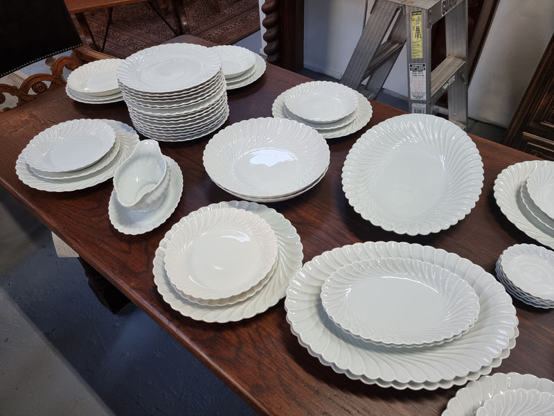 Limoge "Haviland" large white part dinner service. Includes some white service with gilt decoration. Although most items are in good condition please note two plates do have small chips. We are able to supply more photos on request.