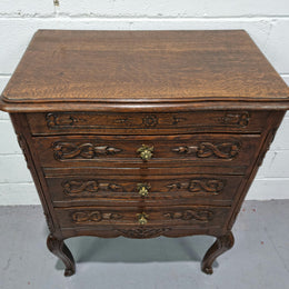 Lovely French dark oak chest of 3 drawers with beautiful carving and details. In good original detailed condition.