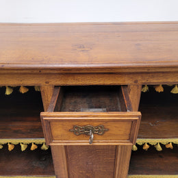Amazing French Oak early 19th Century two door sideboard with one drawer and two fixed shelves. Sourced from France and in good original detailed condition.