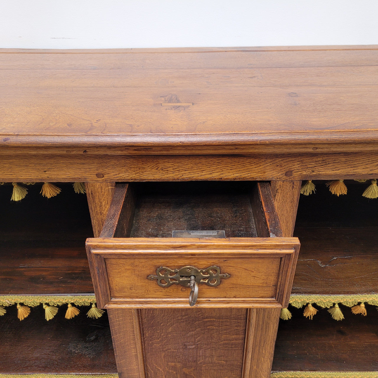 Amazing French Oak early 19th Century two door sideboard with one drawer and two fixed shelves. Sourced from France and in good original detailed condition.