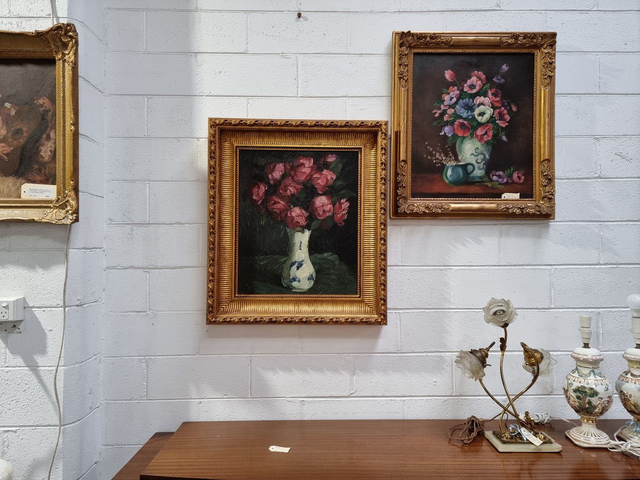 French floral signed oil painting of flowers in a vase in a stunning gilt frame. In good original condition.