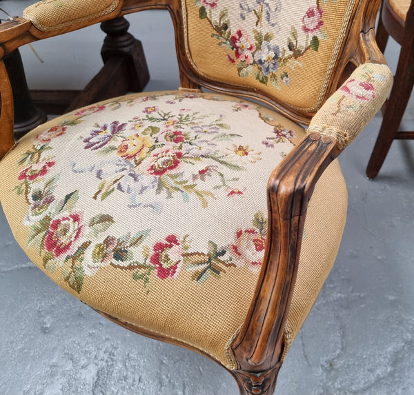 Louis XV style Walnut and tapestry armchair. Very comfortable to sit in and tapestry is in good original used condition.