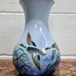 Lovely vintage vase by Falconware potteries, featuring ducks flying over reeds on a lake. It has some crazing, but no damage. Good condition, commensurate with the age, please view photos.