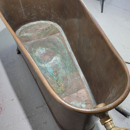 Sourced from France a rare full copper Antique bath tub on feet and includes an overflow, fittings, taps ect. In good original condition.
