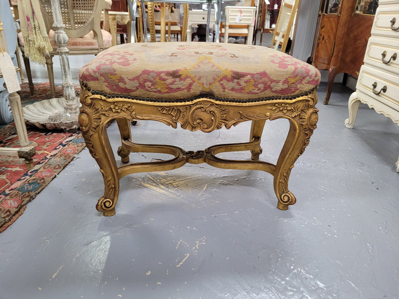 Charming 19th Century gilt wood tapestry covered Louis XV style stool. It has a beautifully carved base and undercarriage and it has been sourced from France. It is in good original detailed condition, please view photos of tapestry has they help form part of the description.