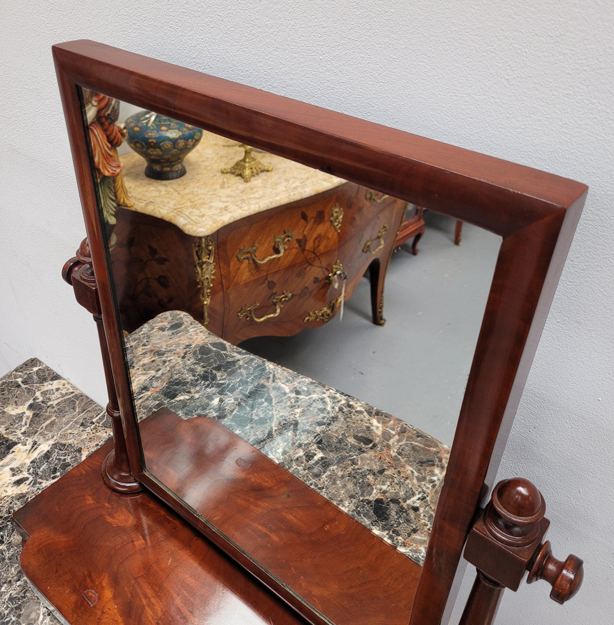 Antique Mahogany dressing table mirror. The mirror is still in good condition and tilts back and forward. It is in overall good original condition. Please view photos as they help form part of the description.