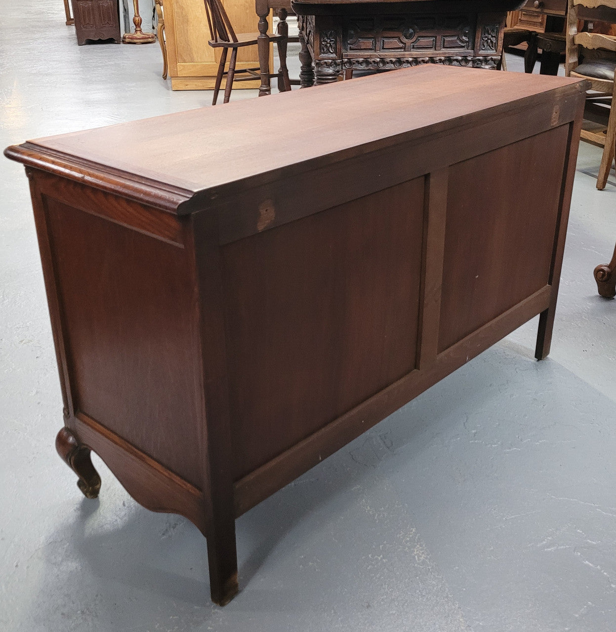 A hard to find Louis XV style French two door cabinet which would make an ideal TV cabinet. It has been sourced from France and in good original detailed condition.