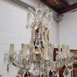 Impressive elegant ten arm French crystal chandelier that has been sourced from France. It has been fully rewired to Australian standards and is in good original working condition.