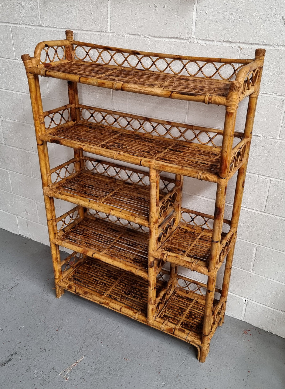 Vintage Tortoiseshell Bamboo Shelves.  Good size unit with irregular shelves. It is in good original condition and it very solid.