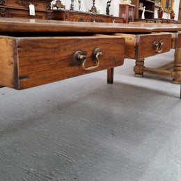 Amazing 19th Century French Oak Farmhouse Style Dining Table with three drawers. It is made from 3 large planks of wood which is very hard to find. 105.5 cm wide.