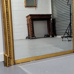 Substantial Louis XI style French Antique over mantel mirror. It is in very good restored condition.