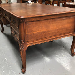 French Oak Louis XV style full partners desk with both sides having five functional drawers. In very good original detailed condition.
