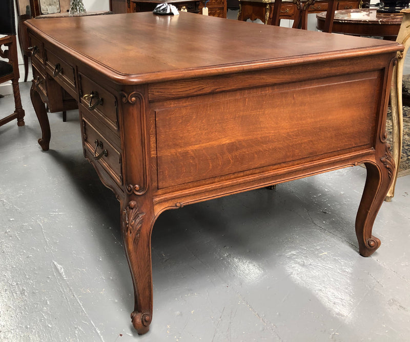 French Oak Louis XV style full partners desk with both sides having five functional drawers. In very good original detailed condition.