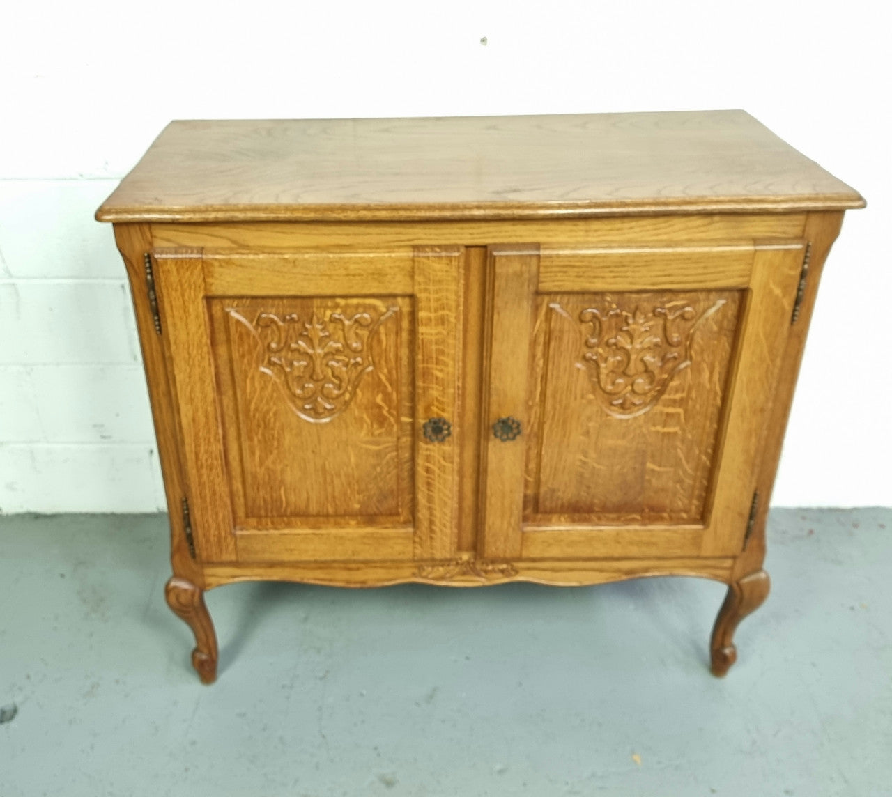 Vintage French Oak two door cabinet which would make an ideal TV cabinet or storage unit. In good original detailed condition.