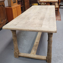 Beautilful raw solid oak French pedestal extension table. It has been sourced from France and is in good original detailed condition. When the table is fully extended it is 339 cm long and can comfortable seat 10-12 people. Features raw wood that could be used as is for a distressed look, or finished and waxed for a more refined look.