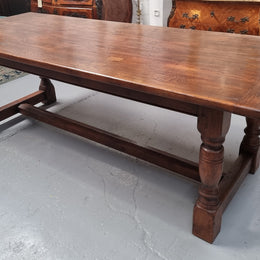Vintage French Oak stretcher base farmhouse table. It is in good original condition.