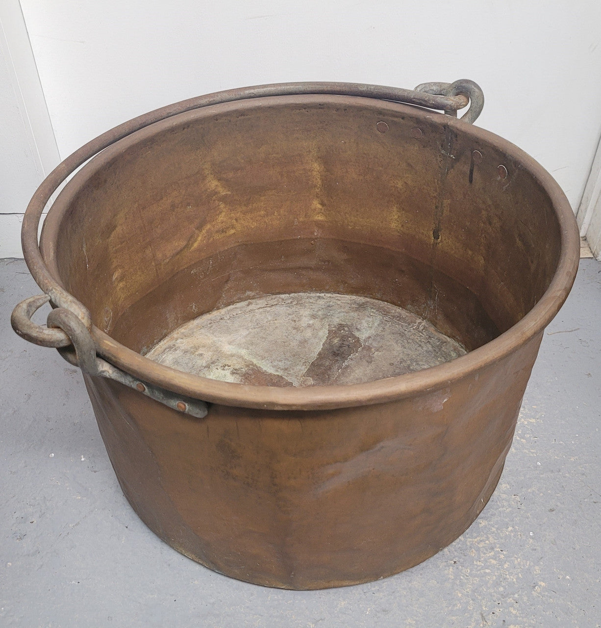 Large Antique French copper pot with wrought iron handle. It is in good original condition.
