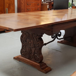 A beautiful French oak, Spanish style parquetry top extension table, with amazing carving and lovely details in very good condition.