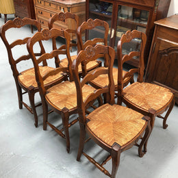 Set of six French rush seat dining chairs and in good sturdy condition.