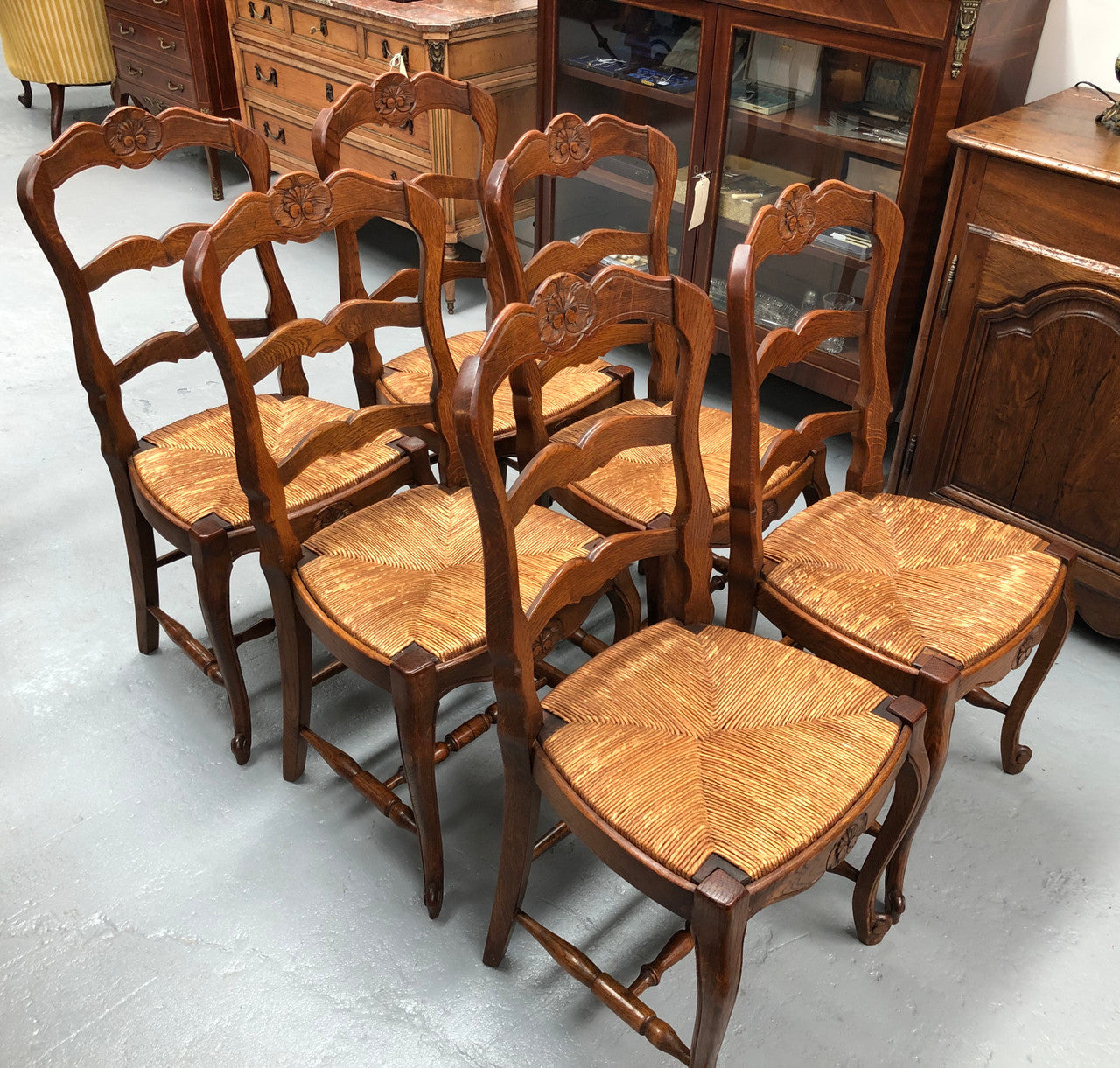 Set of six French rush seat dining chairs and in good sturdy condition.