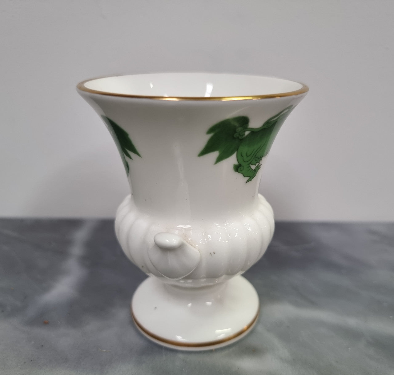 Wedgwood small urn vase with a dragon pattern and gold trim, in great original condition.