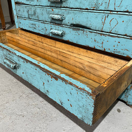Fabulous set of vintage painted blue printers drawers that have adjustable separators which can be taken out for large papers. The drawers are various sizes and there is a section on top for working on or for storing brushes or tall items . These would be perfect for artists or jewellery pieces or even architects. Such a beautiful piece of industrial furniture.