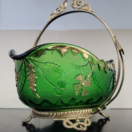 Victorian emerald green and gilt decorated glass bowl with ornate gilt metal stand. It is in good original condition, please view photos as they help form part of the description.
