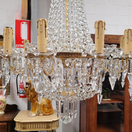Fine French Empire basket shaped crystal chandelier. Consisting of ten exterior arms and four interior lights. It has stunning crystal's with prism drops. It has been sourced from France fully rewired to Australian standards.