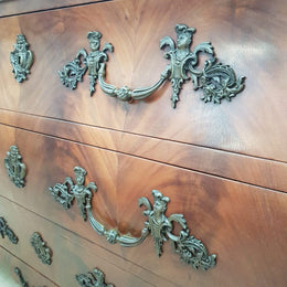 A Grand French Louis XV Style Flame Mahogany Commode