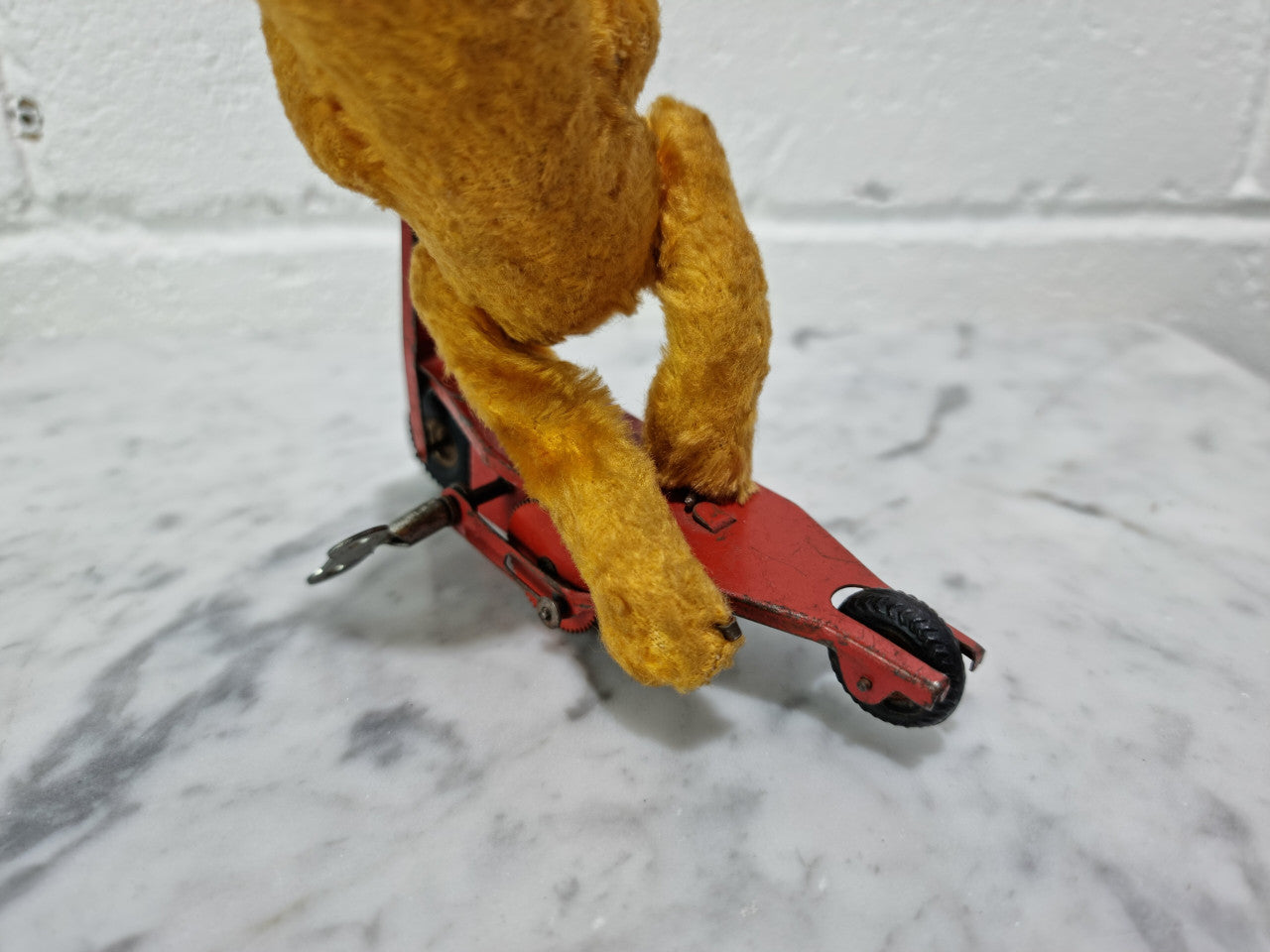 "Gebruder Fendi" Bear Riding Scooter Wind up Toy