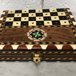 Vintage inlaid folded chess board box with pieces inside. In good clean original condition.