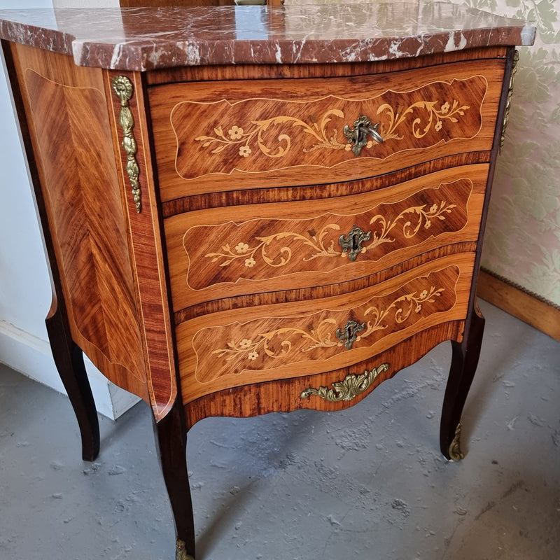 Lovely french 3 drawer Rosewood and Kingwood ,marquetry inlaid commode. There are 3 drawers and a lovely marble top with ormolu mounts in good original detailed condition.