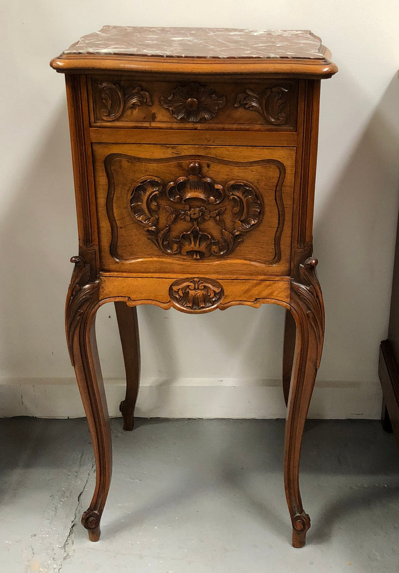 Single French carved bedside with inset marble top. It has beautiful carving and a drawer and cupboard for storage. In very good original detailed condition.